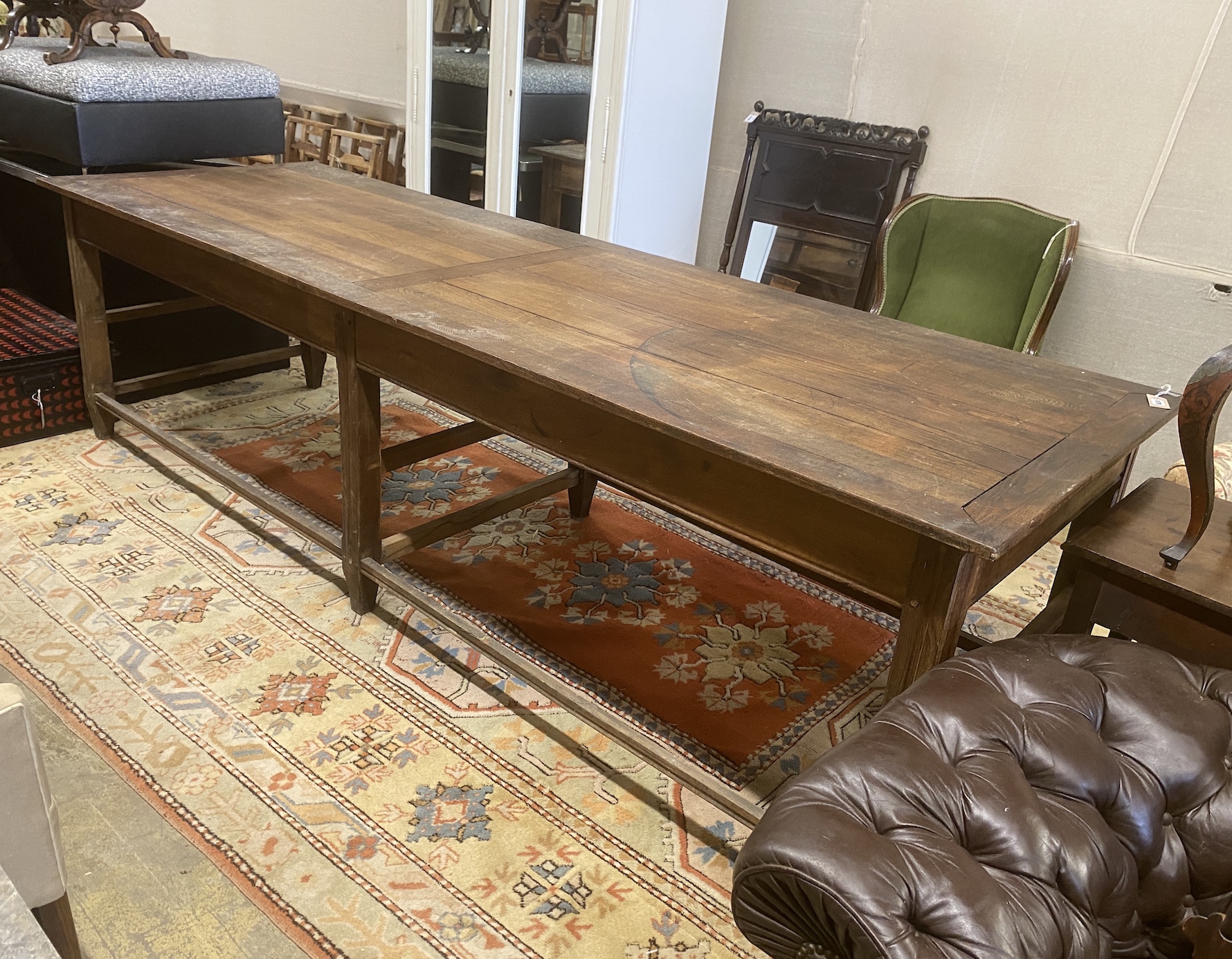 A 19th century French oak serving table, length 300cm, depth 100cm, height 85cm